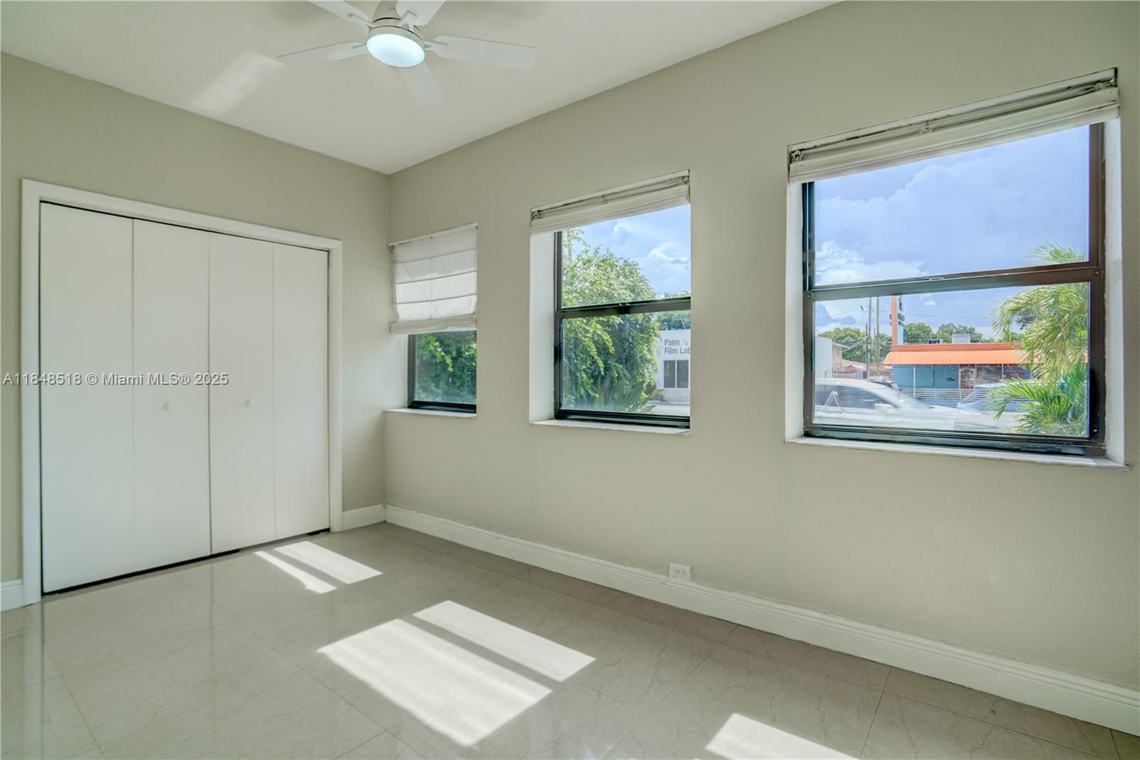 2217 Red Road Coral Gables, FL 33155 - Photo 21 of 33 an empty room with windows