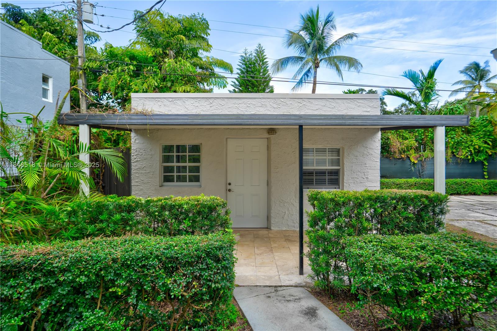 2217 Red Road Coral Gables, FL 33155 - Photo 25 of 33 a house view with a garden space
