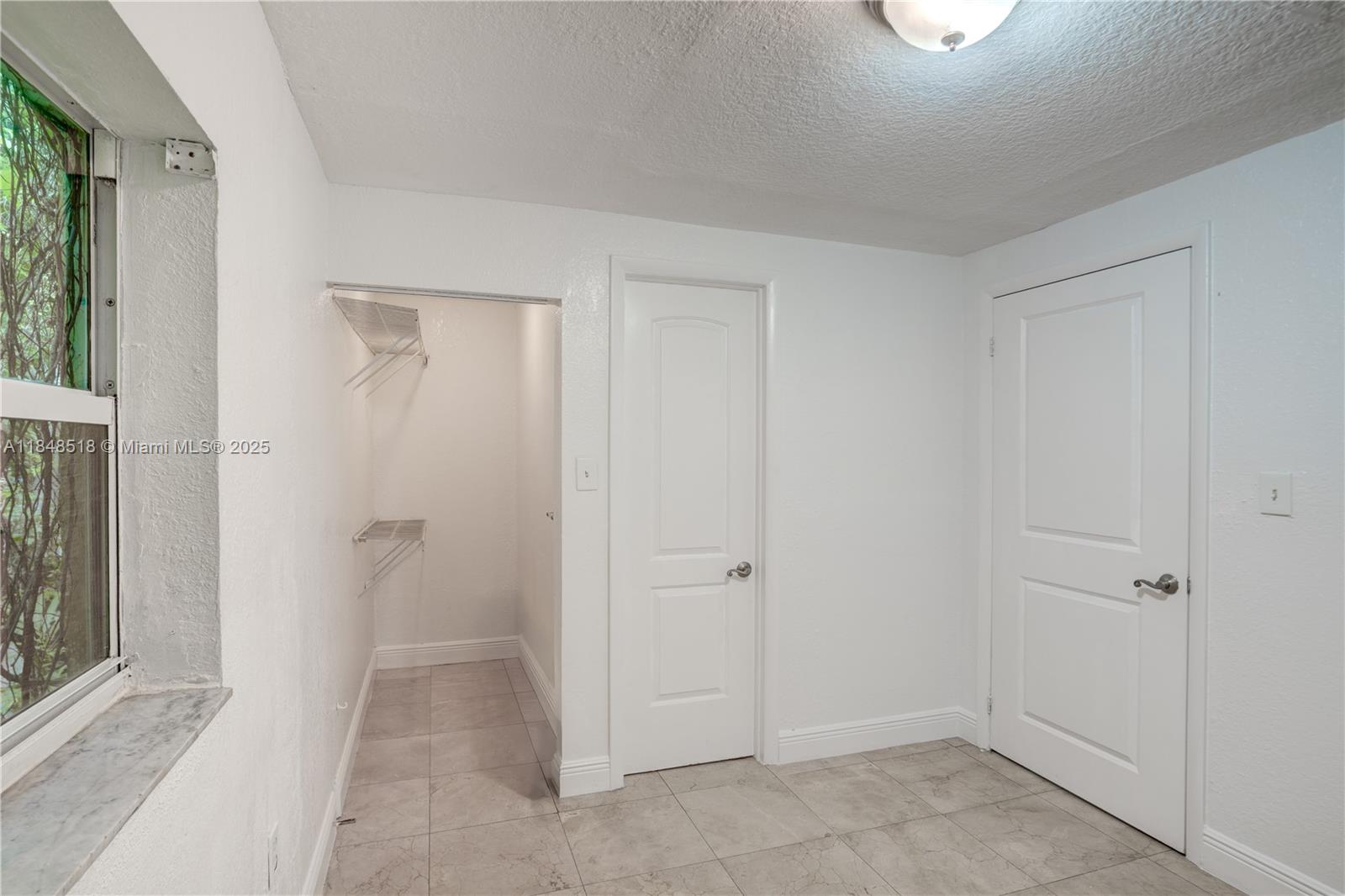 2217 Red Road Coral Gables, FL 33155 - Photo 28 of 33 a view of room with window