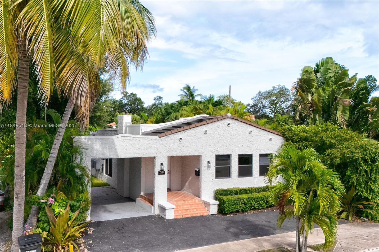 2217 Red Road Coral Gables, FL 33155 - Photo 3 of 33 a view of a house with a yard