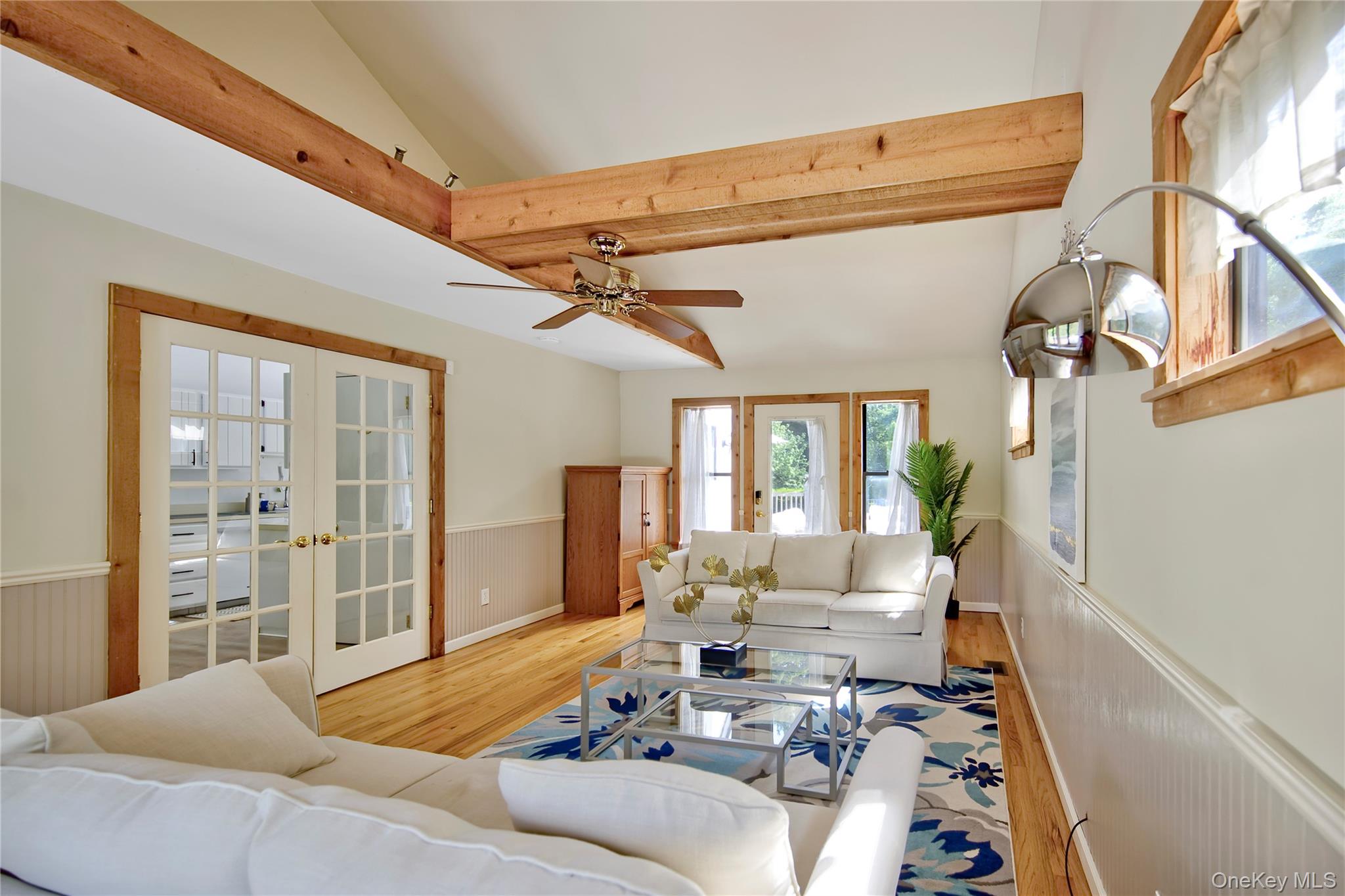 8 School Street Hampton Bays, NY 11946 - Photo 10 of 24 a living room with furniture