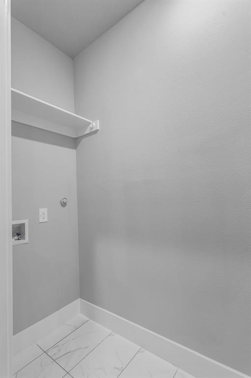 117 West Morton Street Denison, TX 75021 - Photo 25 of 29 Washroom with washer hookup