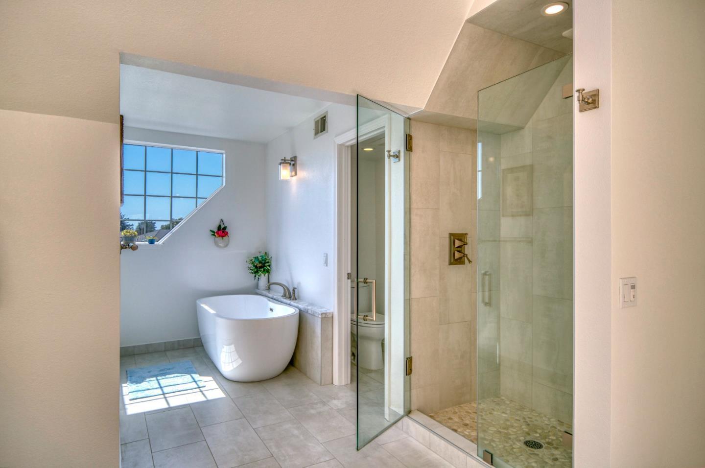 21 Merion Road Half Moon Bay, CA 94019 - Photo 24 of 35 a bathroom with a bathtub and shower