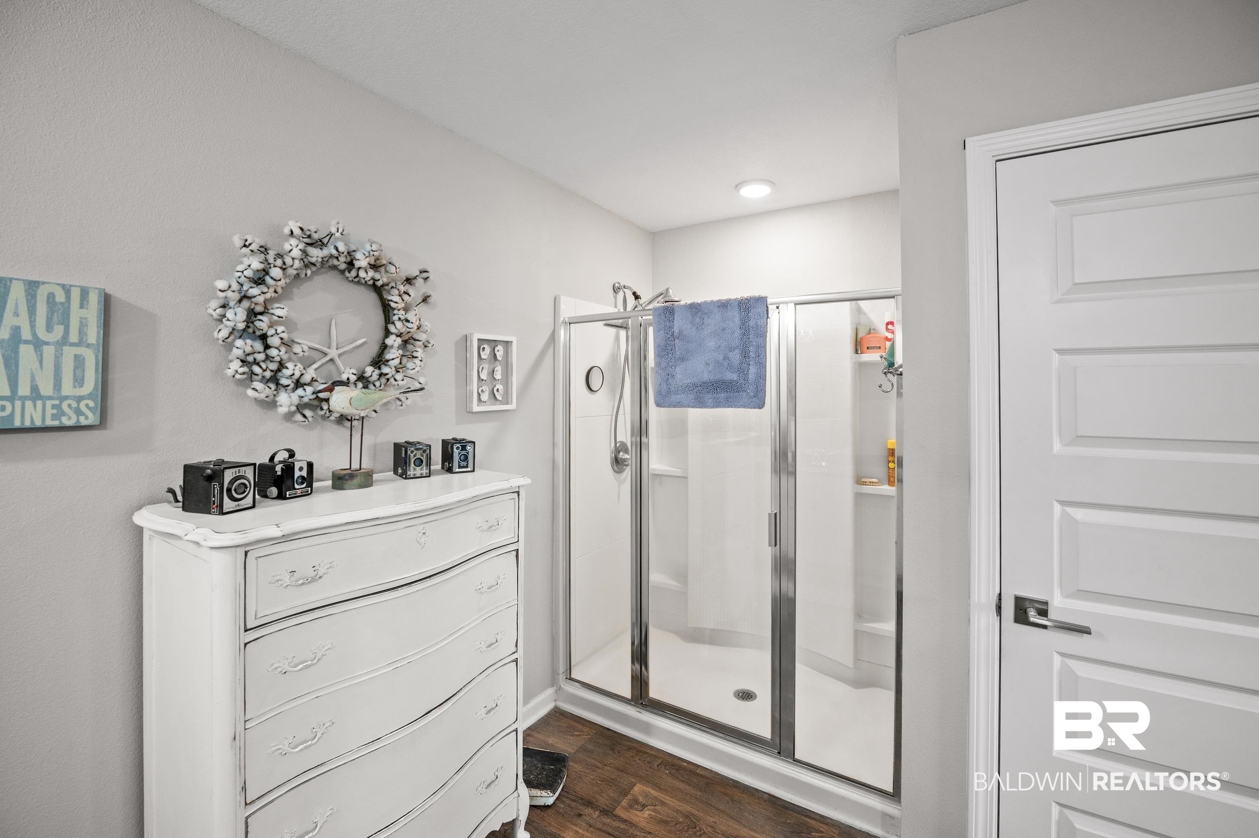 8161 Irwin Loop Daphne, AL 36526 - Photo 21 of 32 Bathroom with wood-type flooring and walk in shower