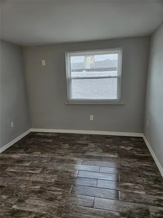 a view of a room that has a window