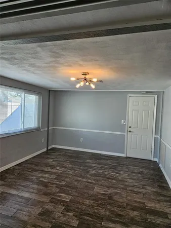 a view of wooden floor and staircase