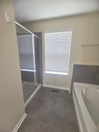 a view of a bathtub in a room