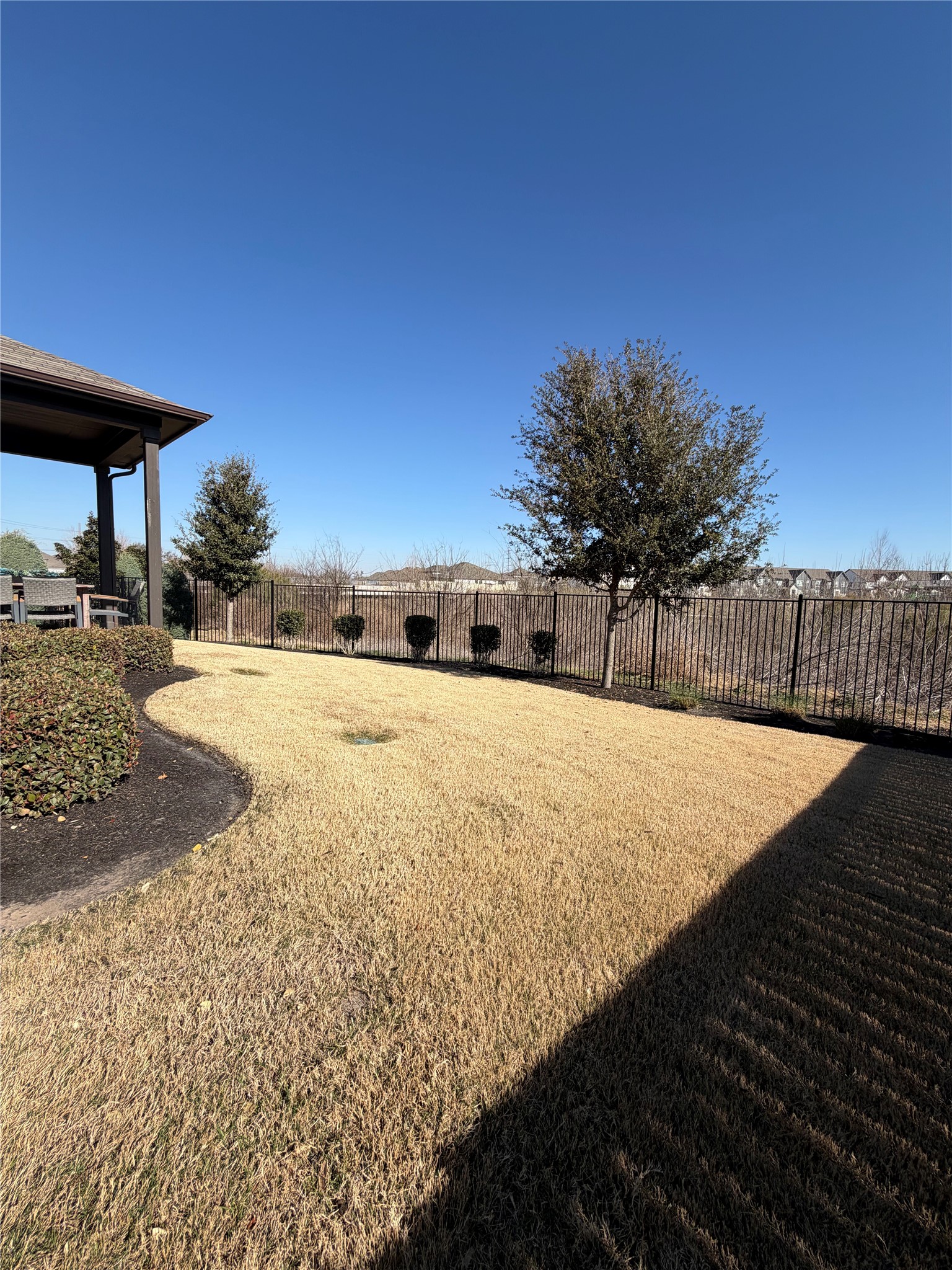 306 Stinchcomb Road Hutto, TX 78634 - Photo 11 of 19 a view of a backyard