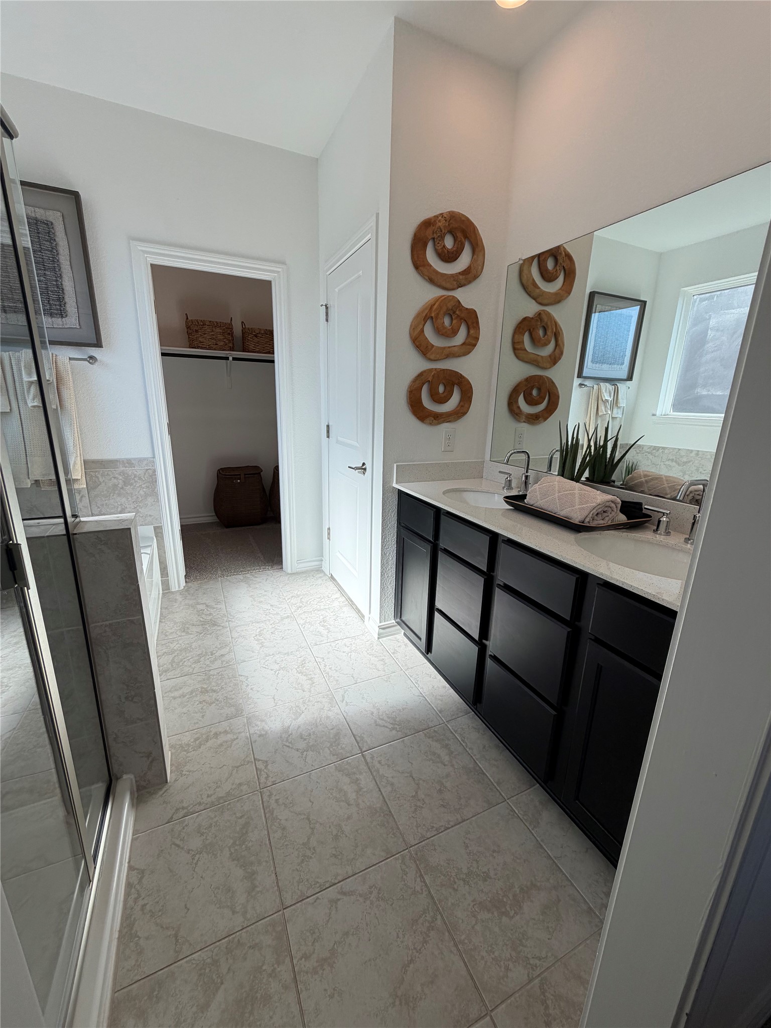 306 Stinchcomb Road Hutto, TX 78634 - Photo 17 of 19 a bathroom with a sink and a mirror