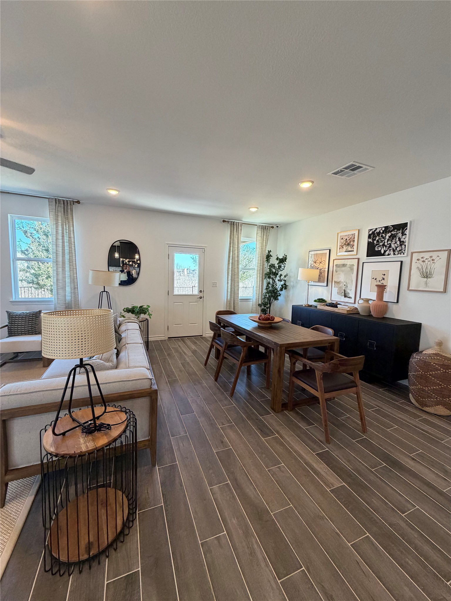 306 Stinchcomb Road Hutto, TX 78634 - Photo 2 of 19 a living room with furniture and a wooden floor