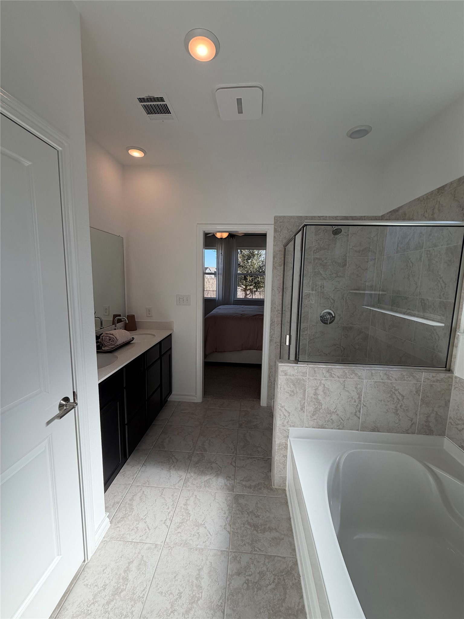 306 Stinchcomb Road Hutto, TX 78634 - Photo 10 of 19 a living room with a couch and a stove