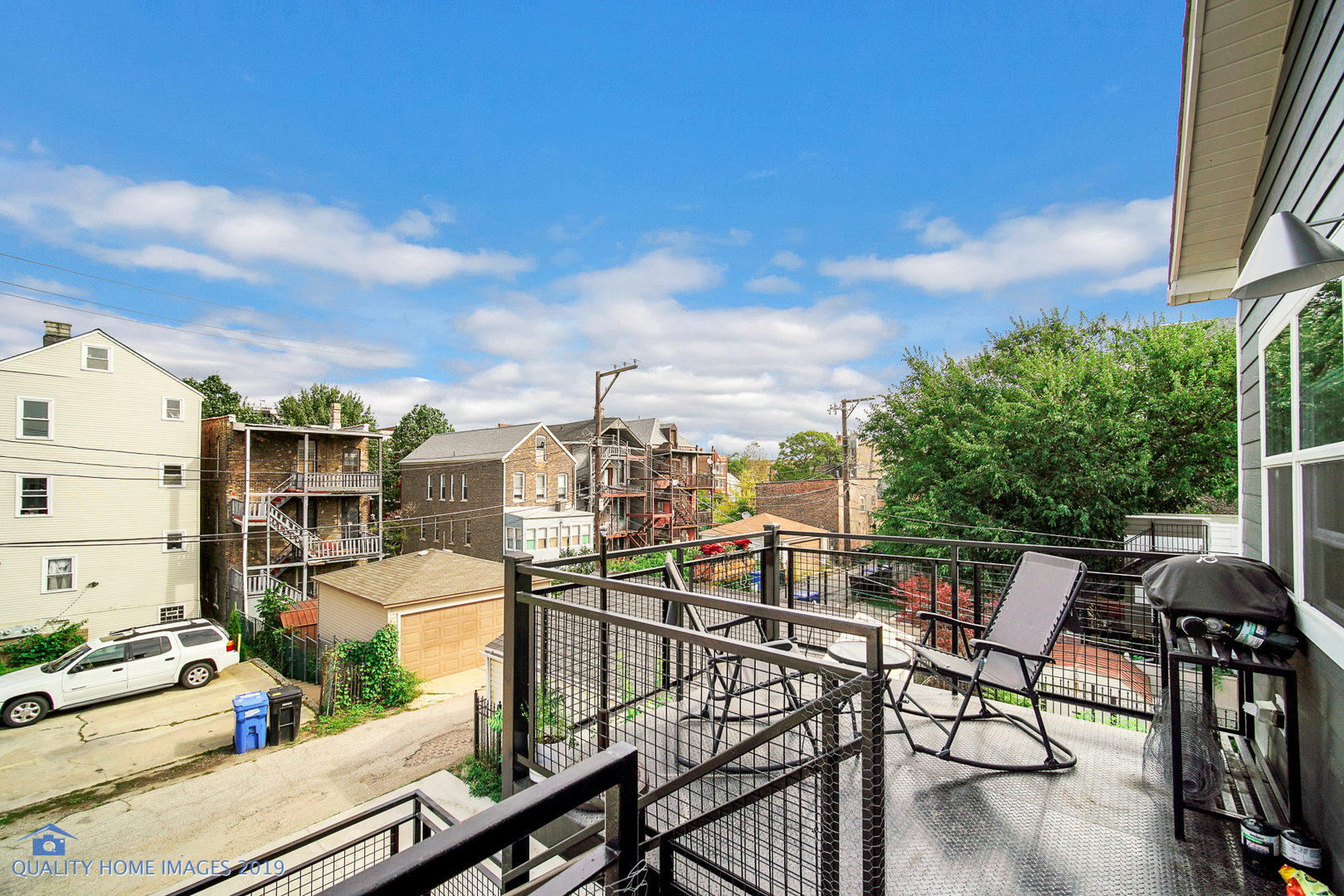 Undisclosed Address Chicago, IL 60608 - Photo 3 of 11 a view of a chairs and table in patio
