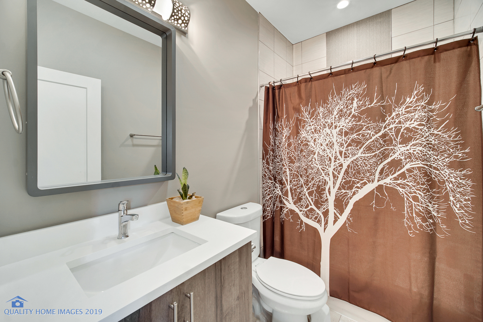 Undisclosed Address Chicago, IL 60608 - Photo 6 of 11 a bathroom with a sink and a mirror