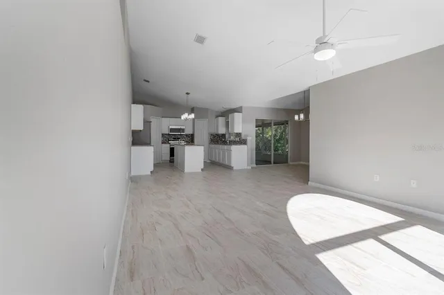 a view of kitchen and windows