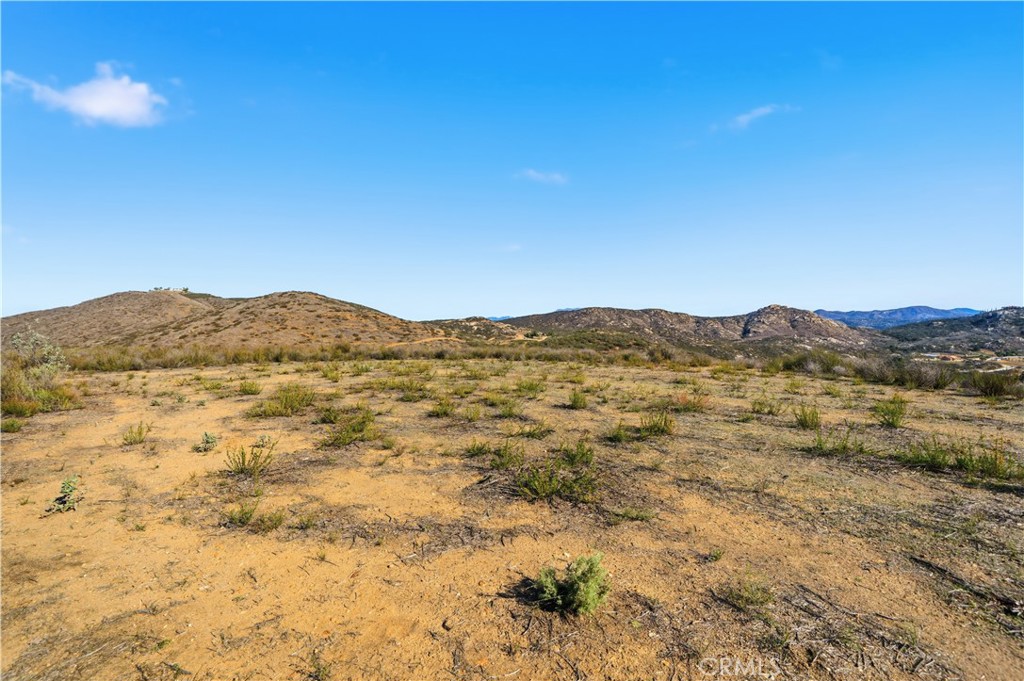 33850 Stage Road Temecula, CA 92592 - Photo 7 of 13 a view of a large mountain with mountains in the background