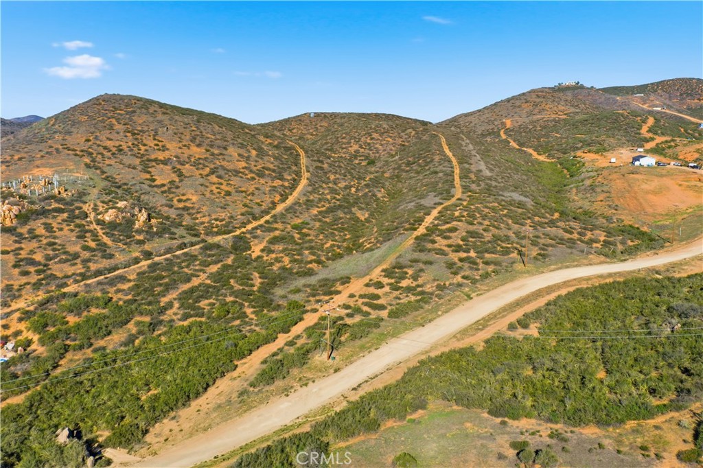 33850 Stage Road Temecula, CA 92592 - Photo 10 of 13 a view of a yard with a mountain