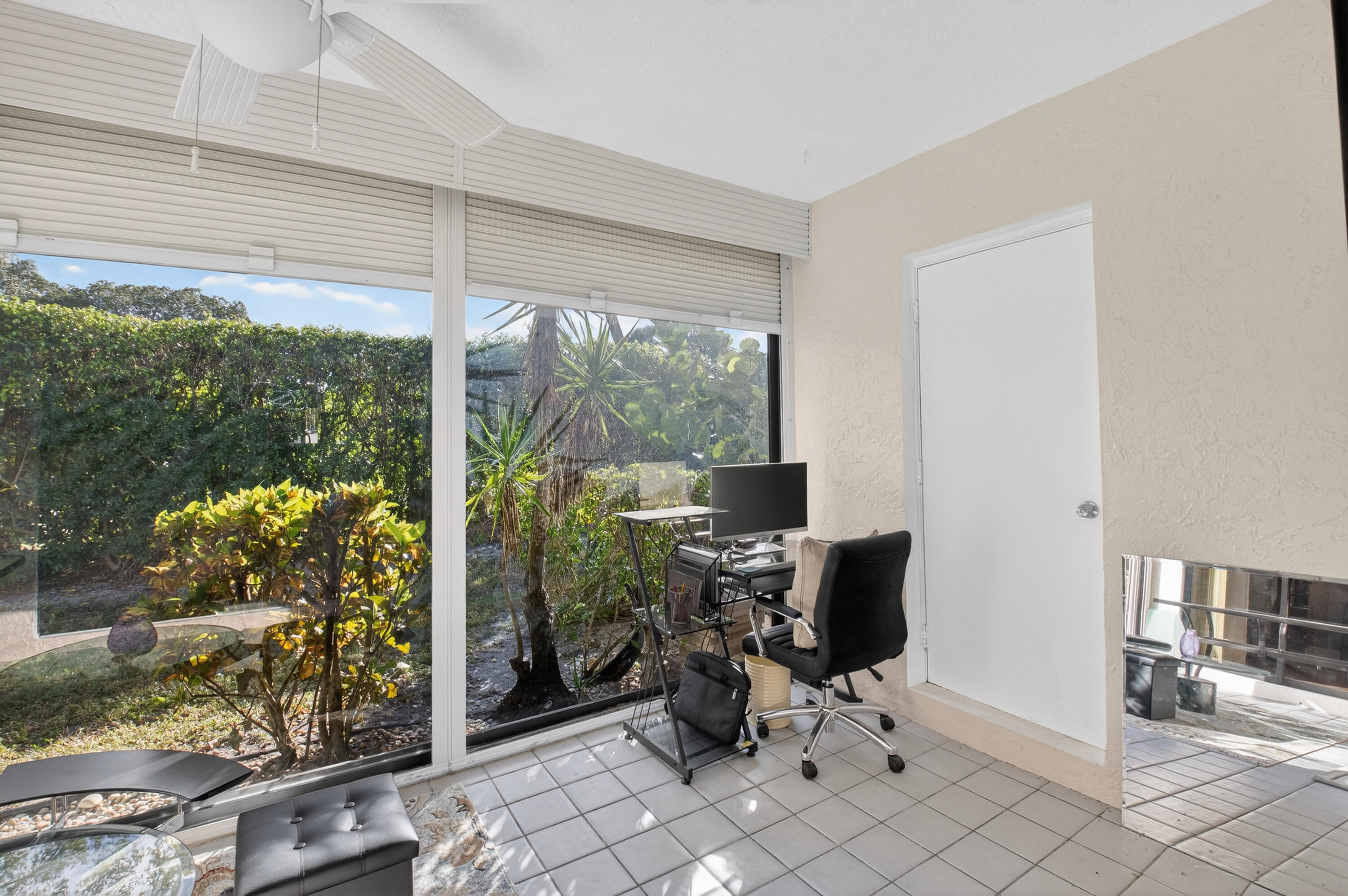 10980 Hidden Lake Place Boca Raton, FL 33498 - Photo 23 of 47 a view of a workspace with furniture