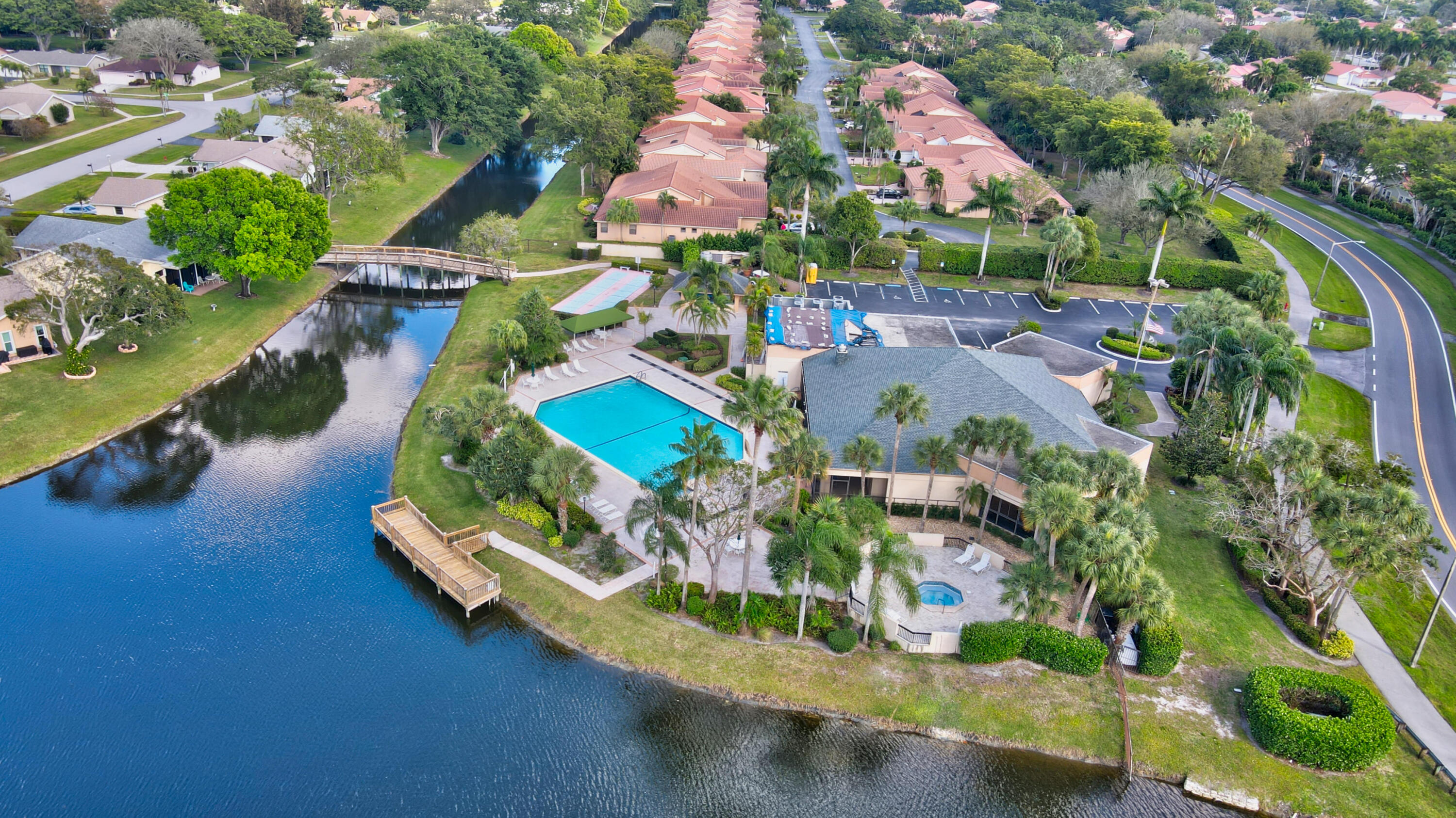10980 Hidden Lake Place Boca Raton, FL 33498 - Photo 32 of 47 an aerial view of house with yard swimming pool and outdoor seating