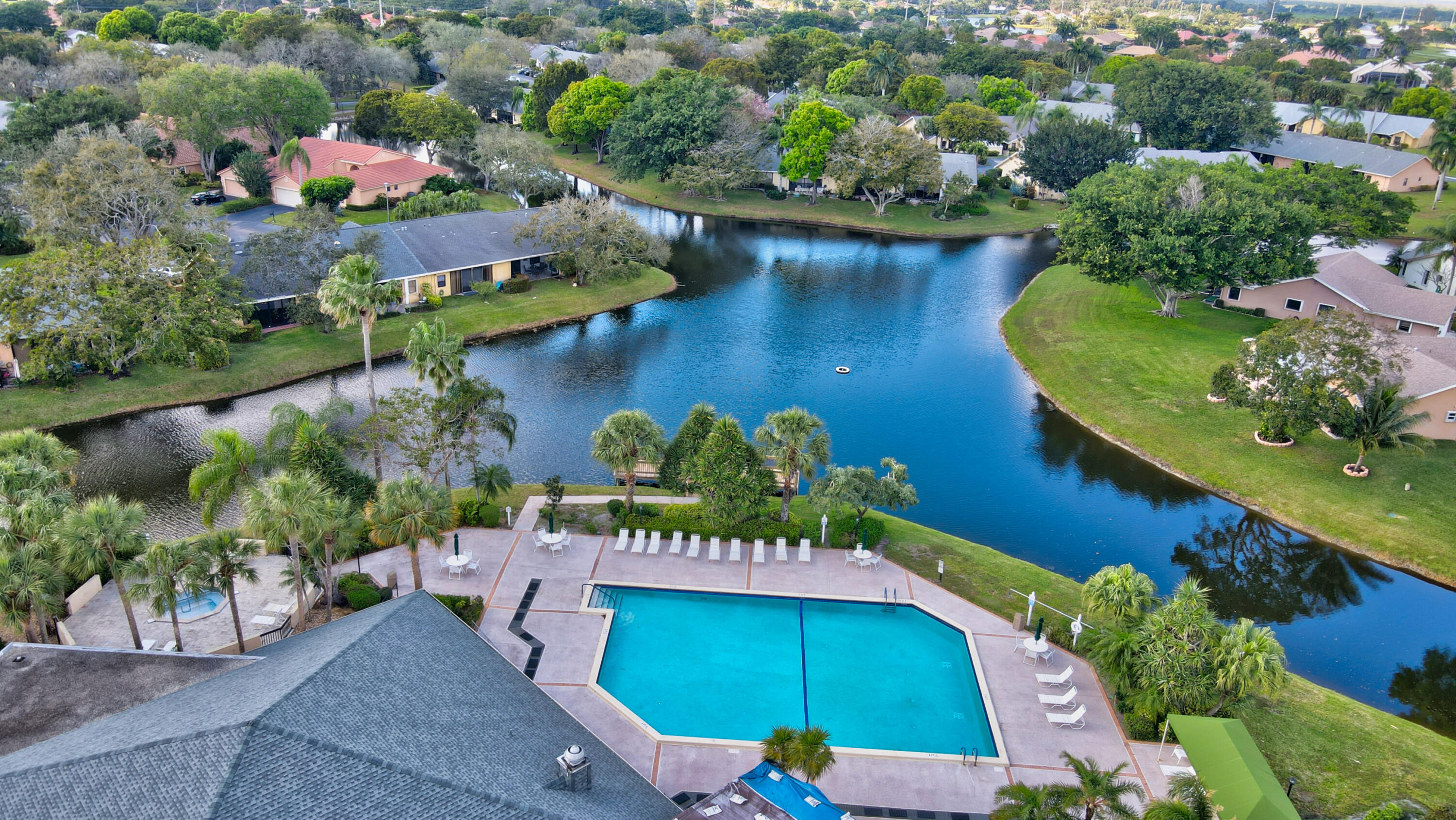 10980 Hidden Lake Place Boca Raton, FL 33498 - Photo 35 of 47 an aerial view of a house a yard and outdoor seating