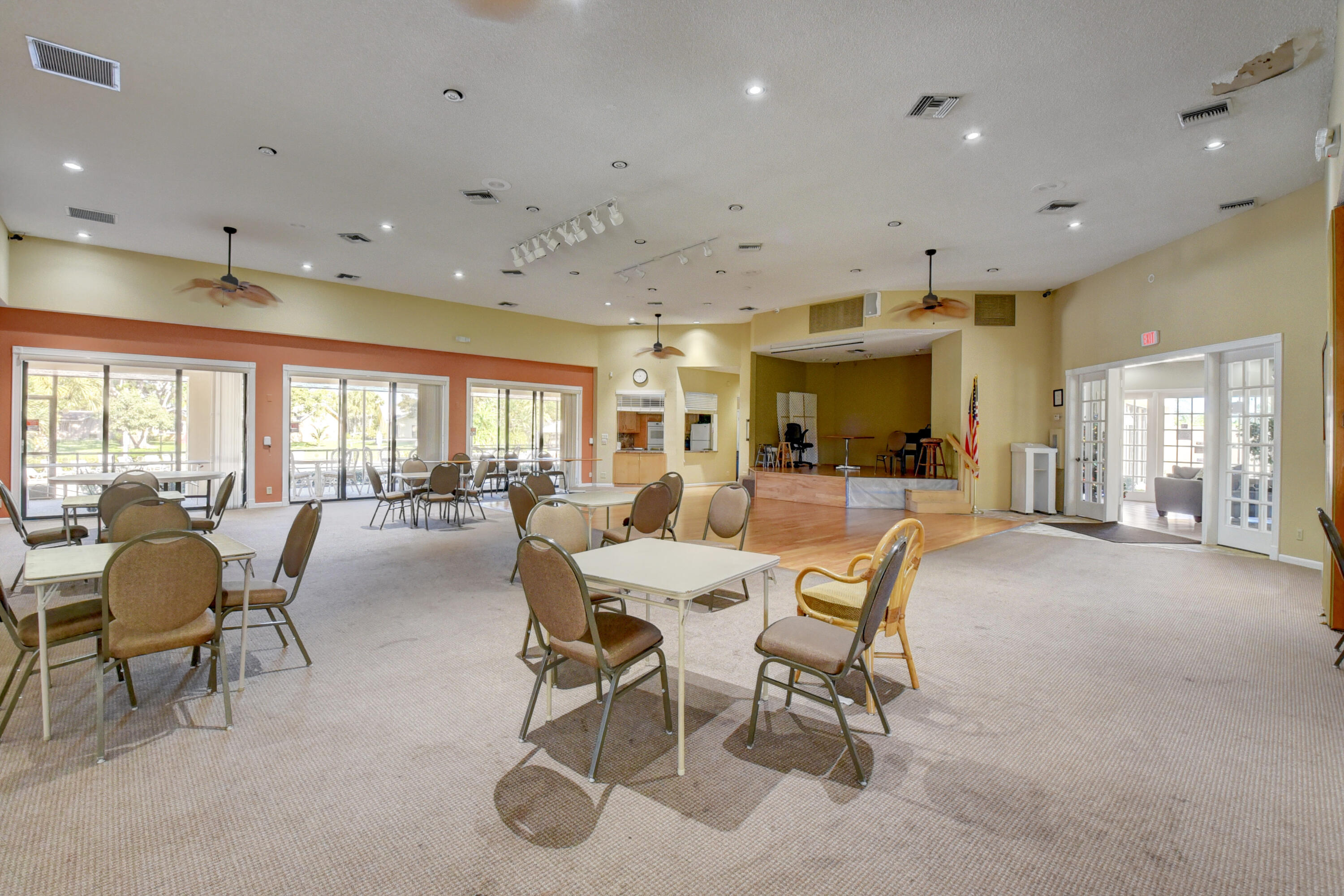 10980 Hidden Lake Place Boca Raton, FL 33498 - Photo 41 of 47 a dining room with furniture and a large window