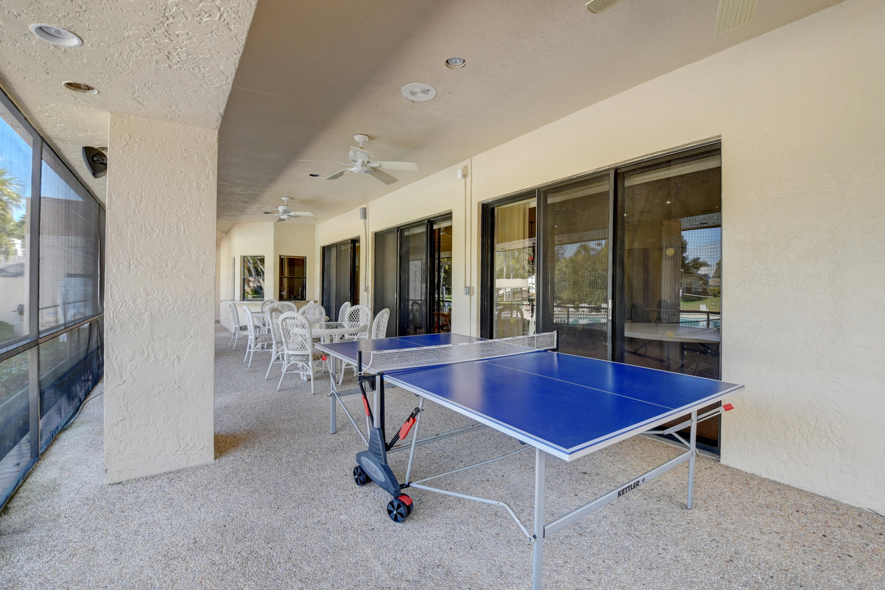 10980 Hidden Lake Place Boca Raton, FL 33498 - Photo 43 of 47 a view of room with table and chairs