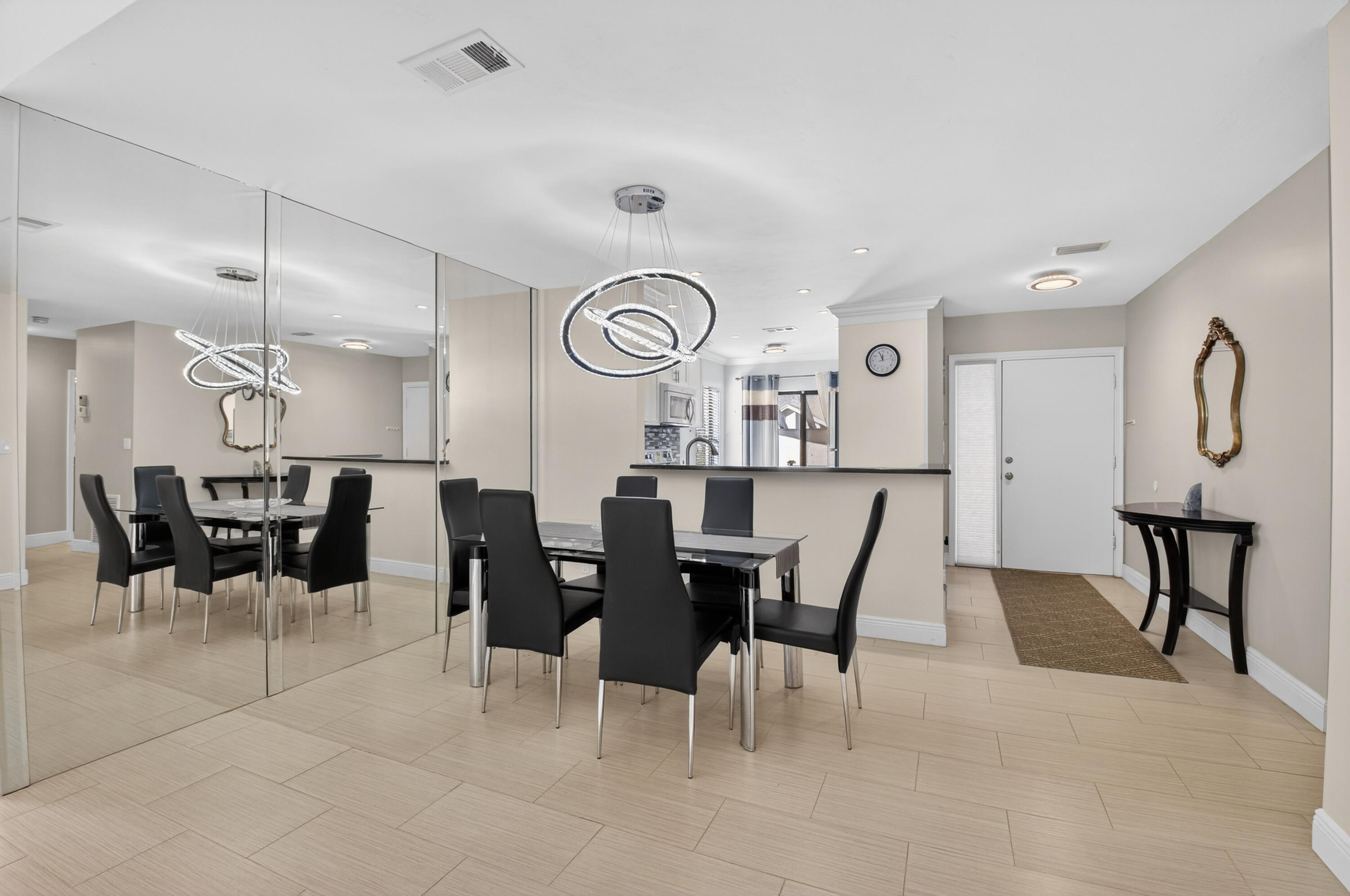 10980 Hidden Lake Place Boca Raton, FL 33498 - Photo 10 of 47 a view of a dining room and livingroom view