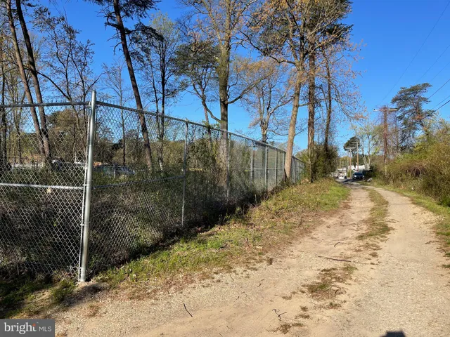 a view of a backyard of the house