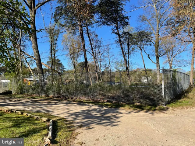a view of a backyard of the house