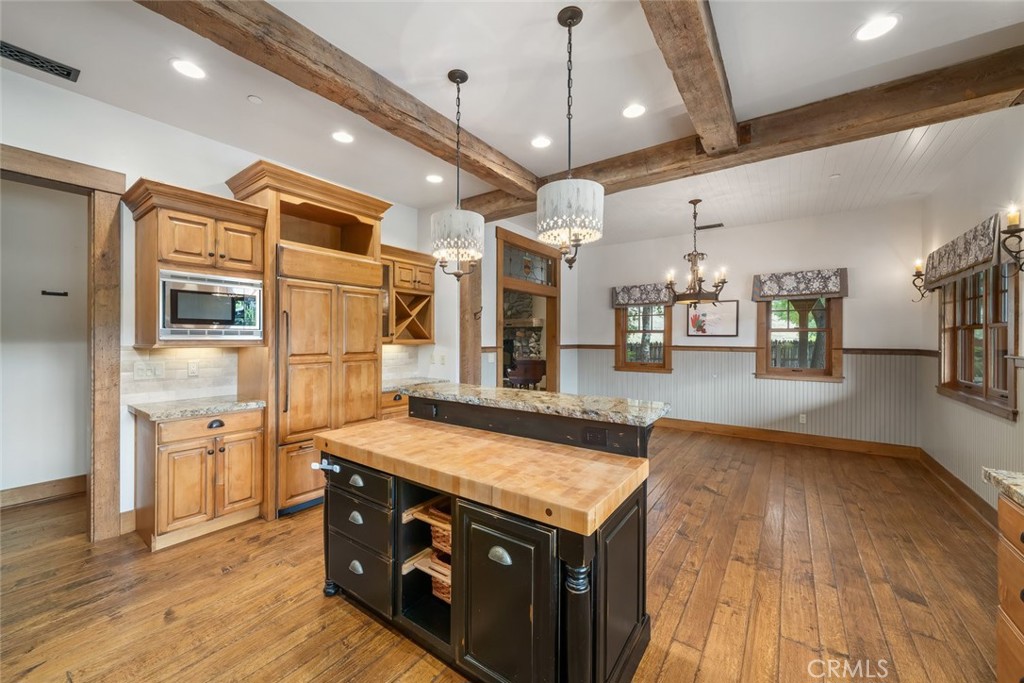 10330 Huasna Road Arroyo Grande, CA 93420 - Photo 11 of 74 a kitchen with stainless steel appliances granite countertop a stove and a refrigerator