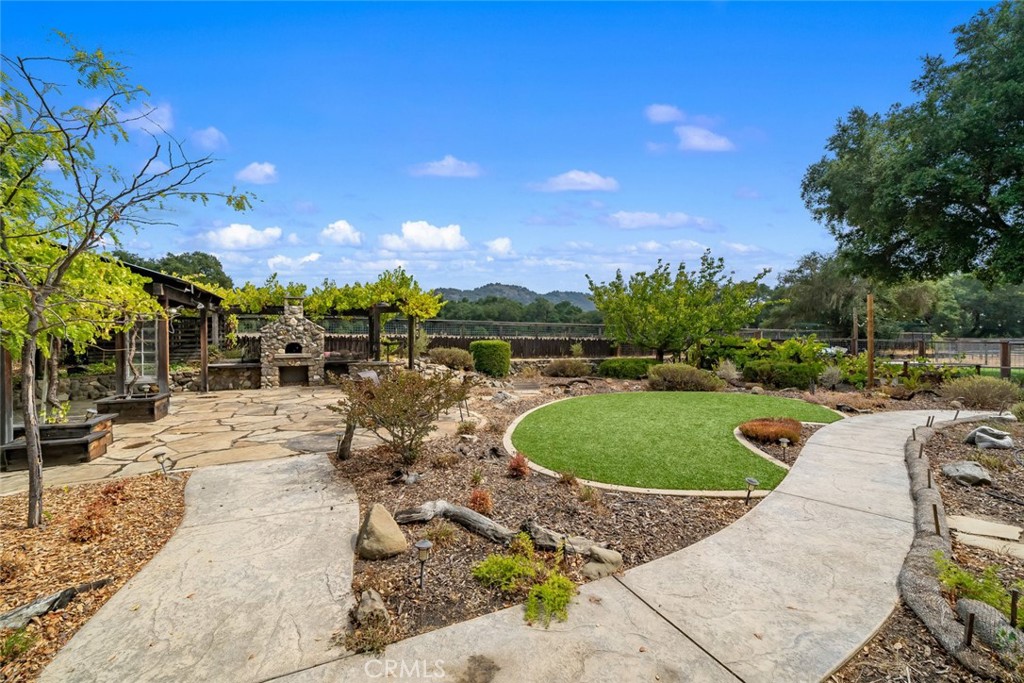 10330 Huasna Road Arroyo Grande, CA 93420 - Photo 16 of 74 a view of a swimming pool with a patio