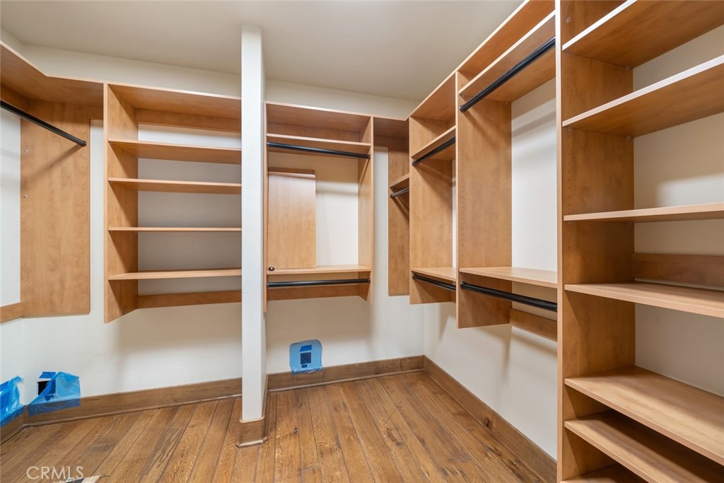10330 Huasna Road Arroyo Grande, CA 93420 - Photo 26 of 74 a view of an empty room with wooden floor and a window
