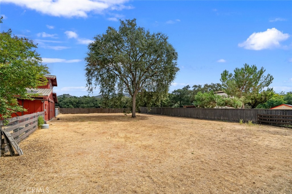 10330 Huasna Road Arroyo Grande, CA 93420 - Photo 63 of 74 a backyard of a house with lots of green space