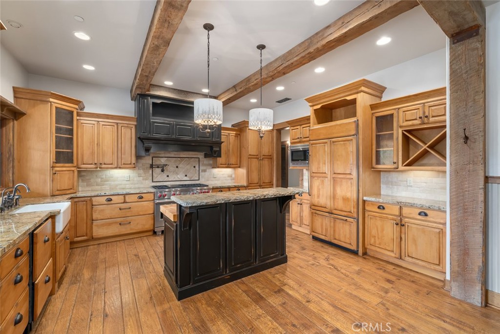 10330 Huasna Road Arroyo Grande, CA 93420 - Photo 10 of 74 a large kitchen with stainless steel appliances granite countertop a stove and cabinets