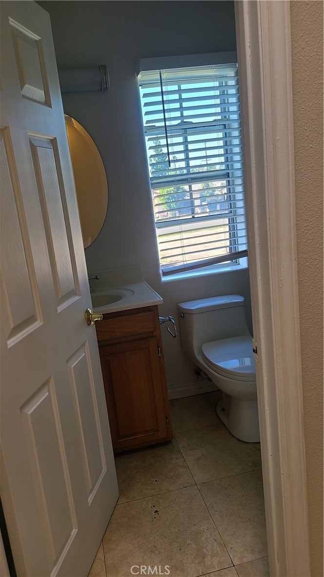 319 Lampman Way Placentia, CA 92870 - Photo 16 of 19 a bathroom with a toilet and a sink