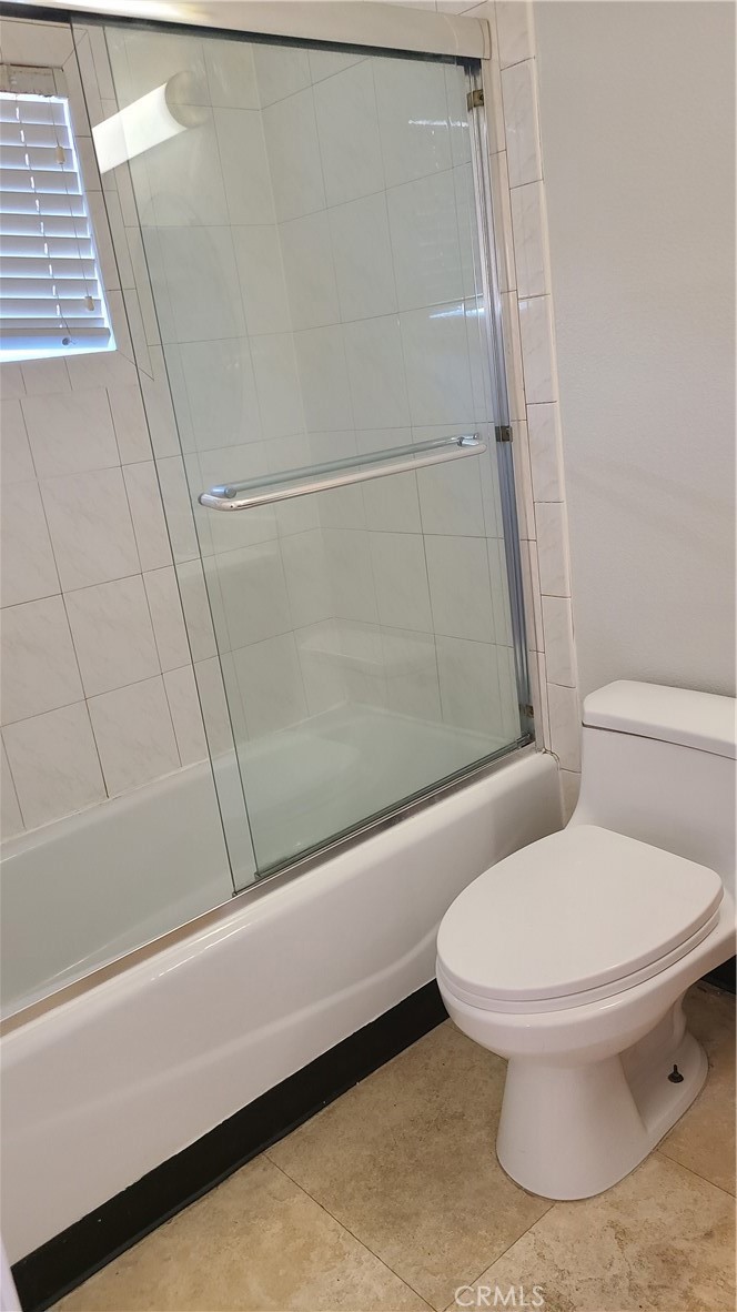 319 Lampman Way Placentia, CA 92870 - Photo 18 of 19 a bathroom with a toilet and a shower