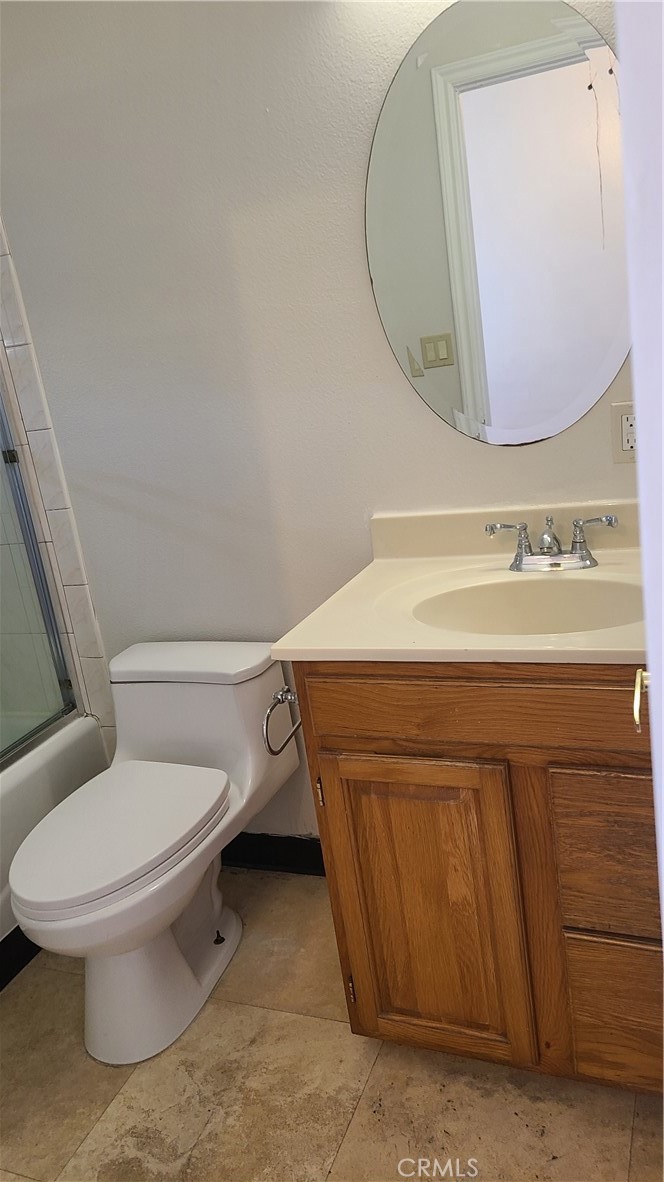 319 Lampman Way Placentia, CA 92870 - Photo 19 of 19 a bathroom with a sink toilet and mirror