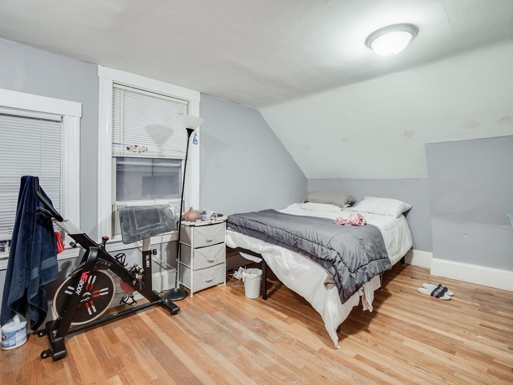 48 Chestnut Street Chelsea, MA 02150 - Photo 25 of 42 a bedroom with bed and a window