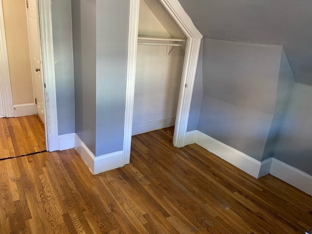 48 Chestnut Street Chelsea, MA 02150 - Photo 28 of 42 a view of front door with wooden floor