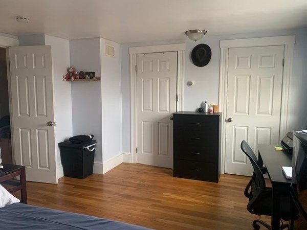 48 Chestnut Street Chelsea, MA 02150 - Photo 30 of 42 a view of a dining room with furniture and wooden floor
