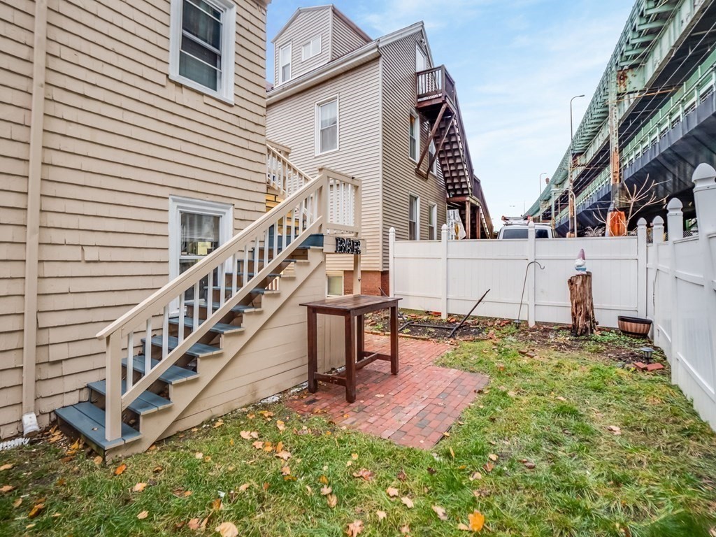 48 Chestnut Street Chelsea, MA 02150 - Photo 38 of 42 a view of a house with backyard and deck