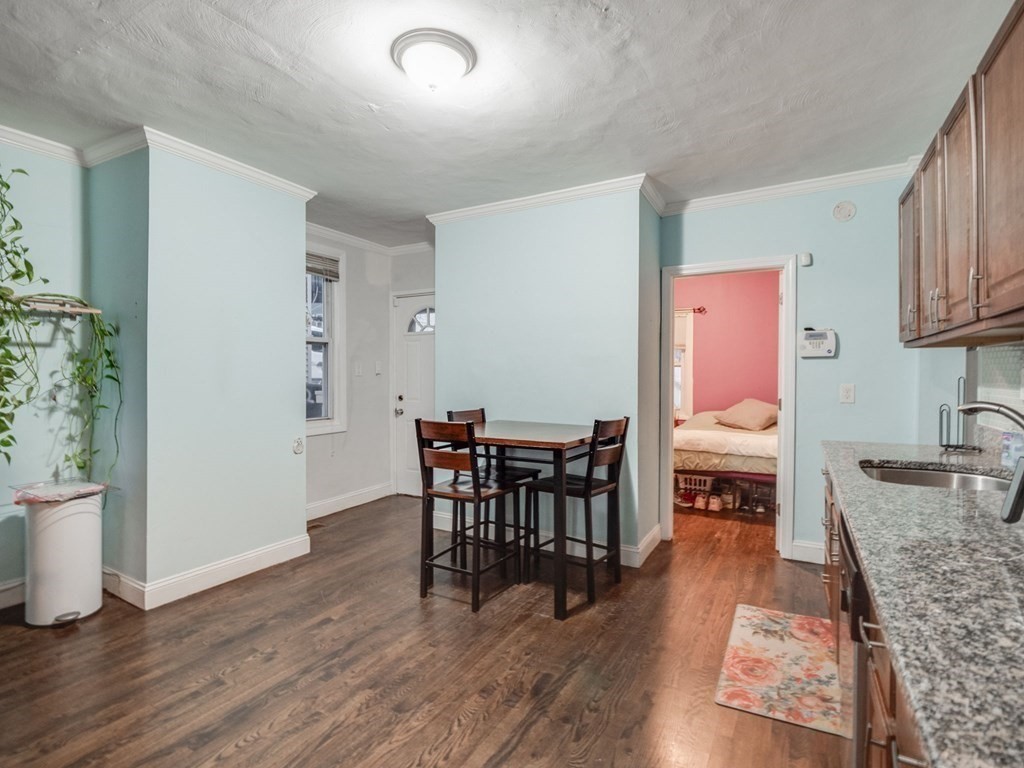 48 Chestnut Street Chelsea, MA 02150 - Photo 8 of 42 a dining room with furniture and wooden floor