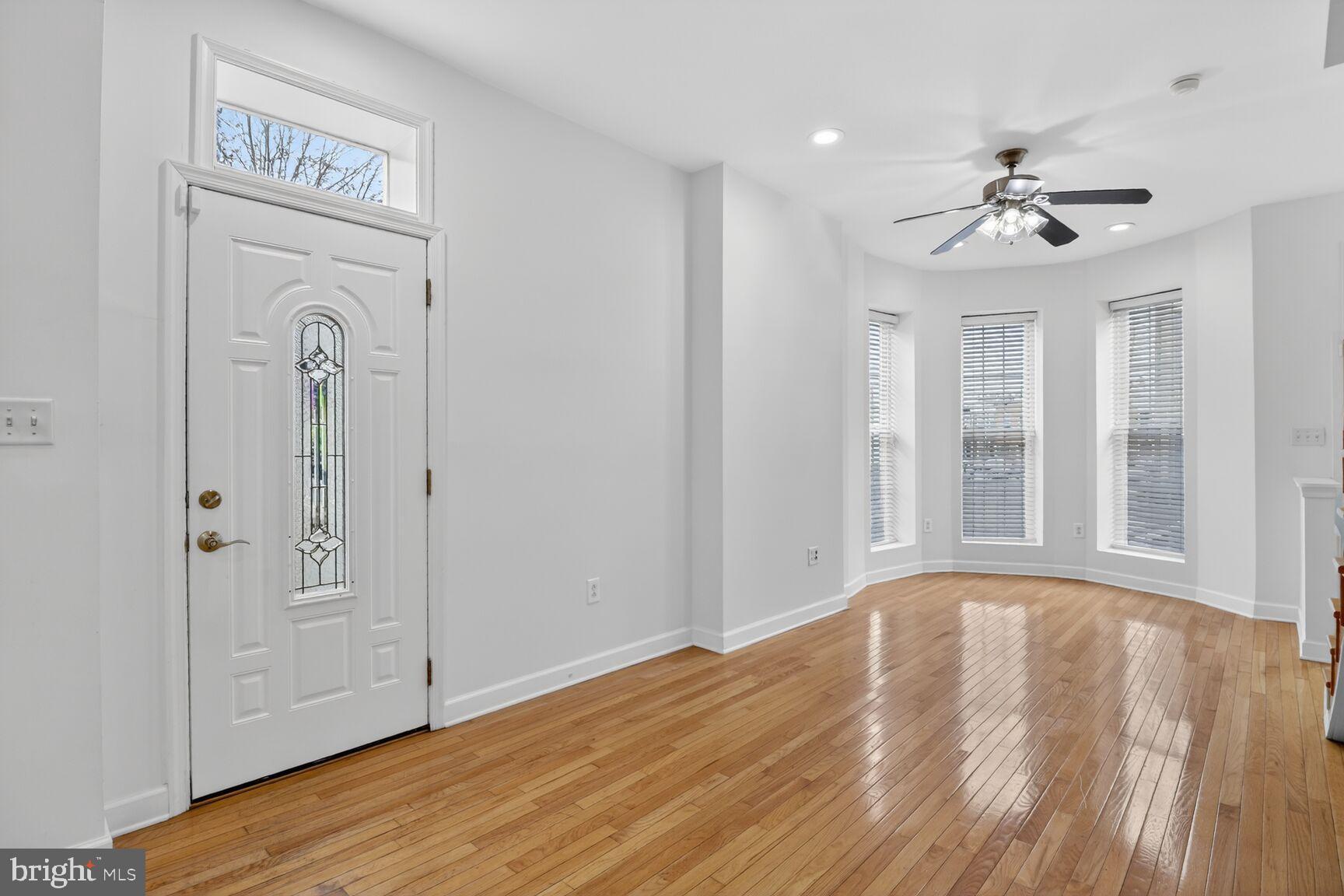 1600 Jackson Street Baltimore, MD 21230 - Photo 5 of 43 Side-door and Living Room