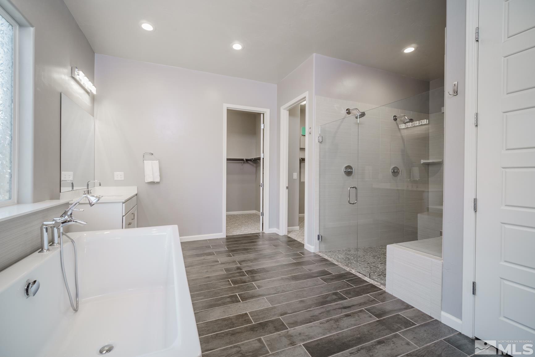 9576 Gazala Lane Reno, NV 89521 - Photo 27 of 40 a bathroom with a sink a toilet and shower