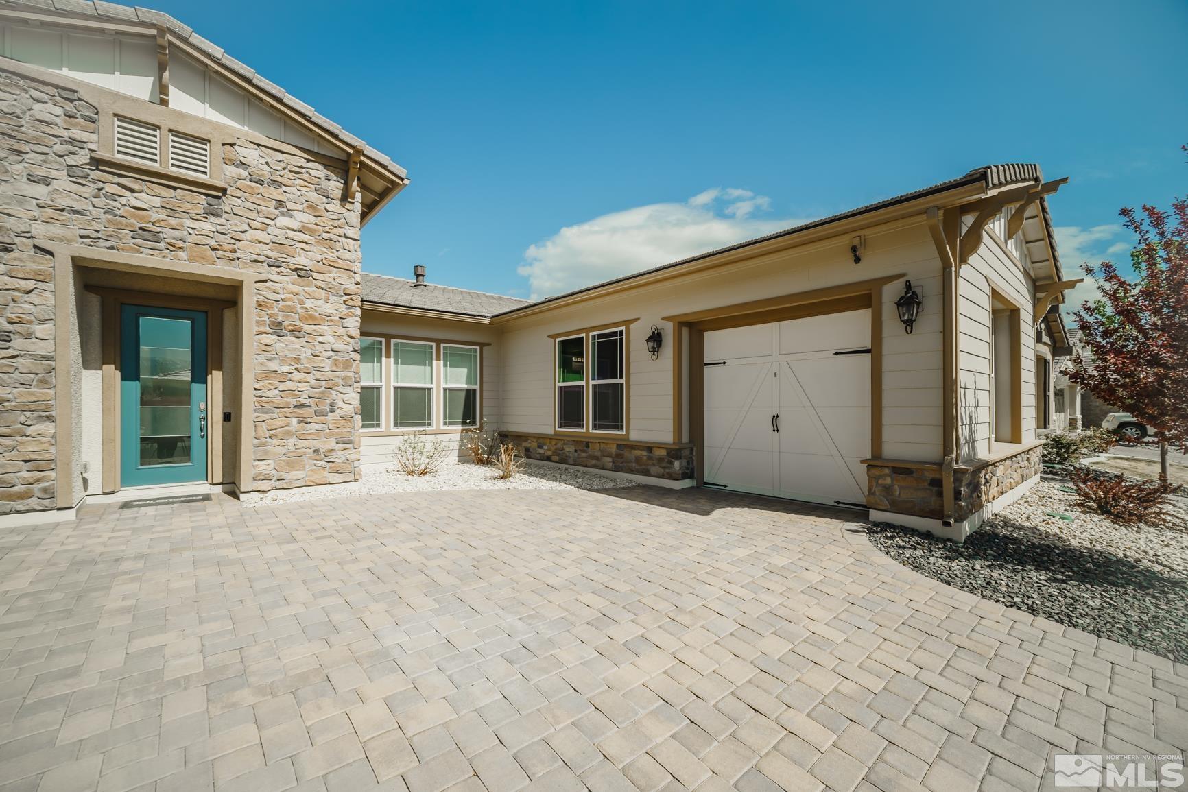 9576 Gazala Lane Reno, NV 89521 - Photo 3 of 40 a view of house with backyard and trees in the background