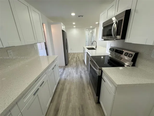 a view of yard with swimming pool