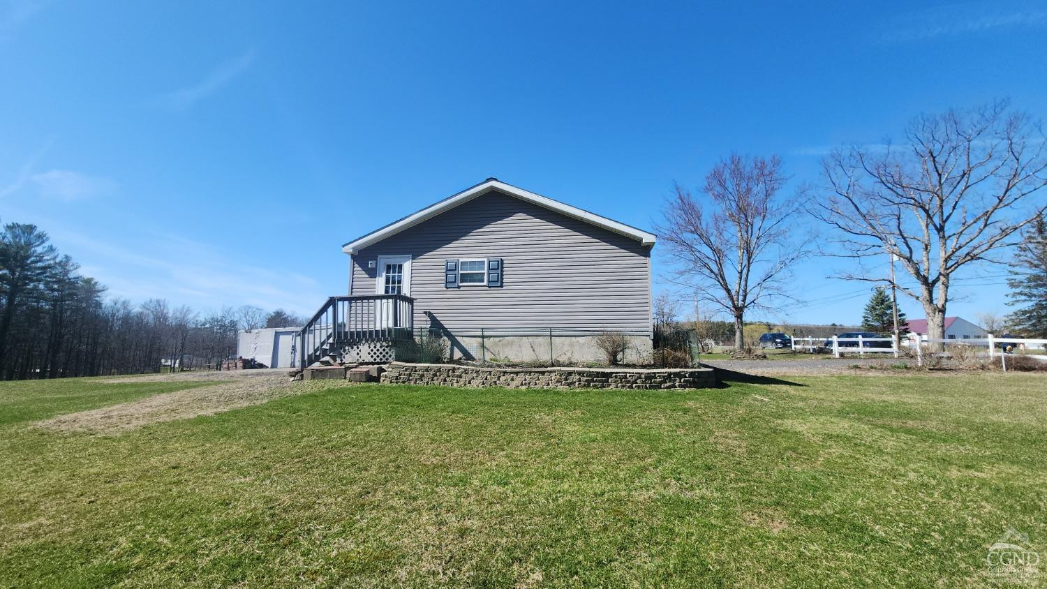 76 Gibson Road Durham, NY 12083 - Photo 17 of 22 a front view of a house with a yard