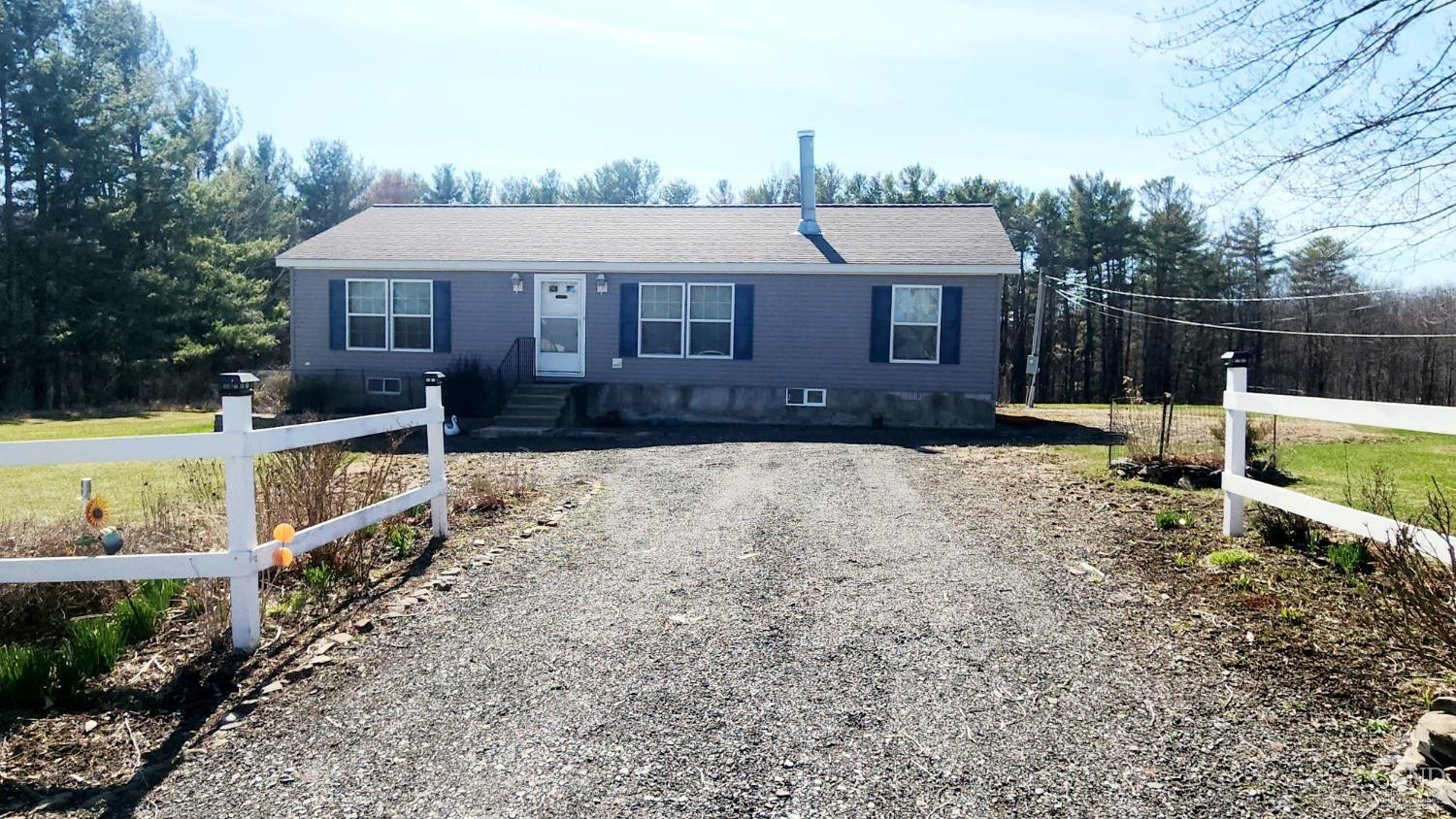 76 Gibson Road Durham, NY 12083 - Photo 21 of 22 a front view of a house with a yard
