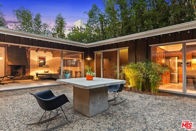 a view of swimming pool with patio