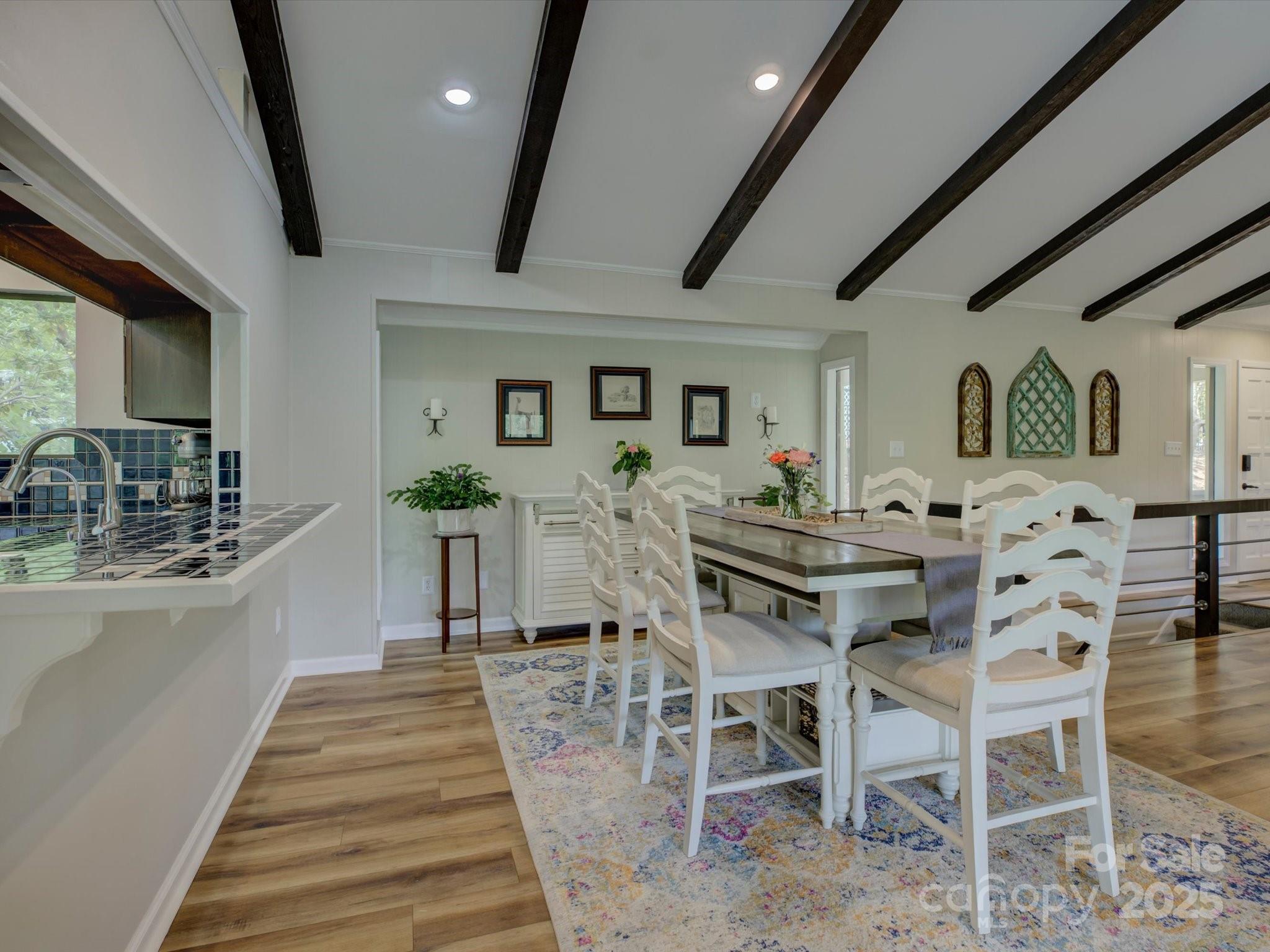 1114 Palmyra Drive Tega Cay, SC 29708 - Photo 12 of 48 a view of a dining room with furniture