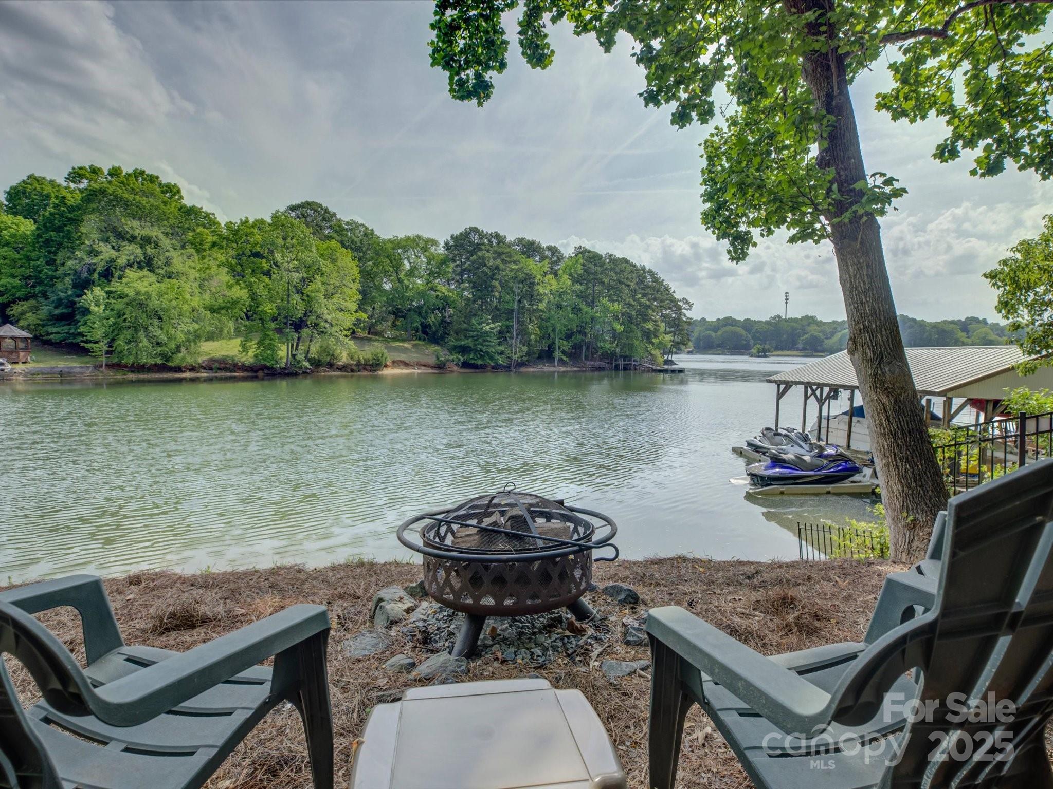 1114 Palmyra Drive Tega Cay, SC 29708 - Photo 36 of 48 a view of a lake with outside area
